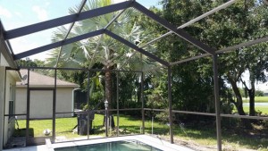 Pool cage painting by Tampa Bay Rescreens & Repair